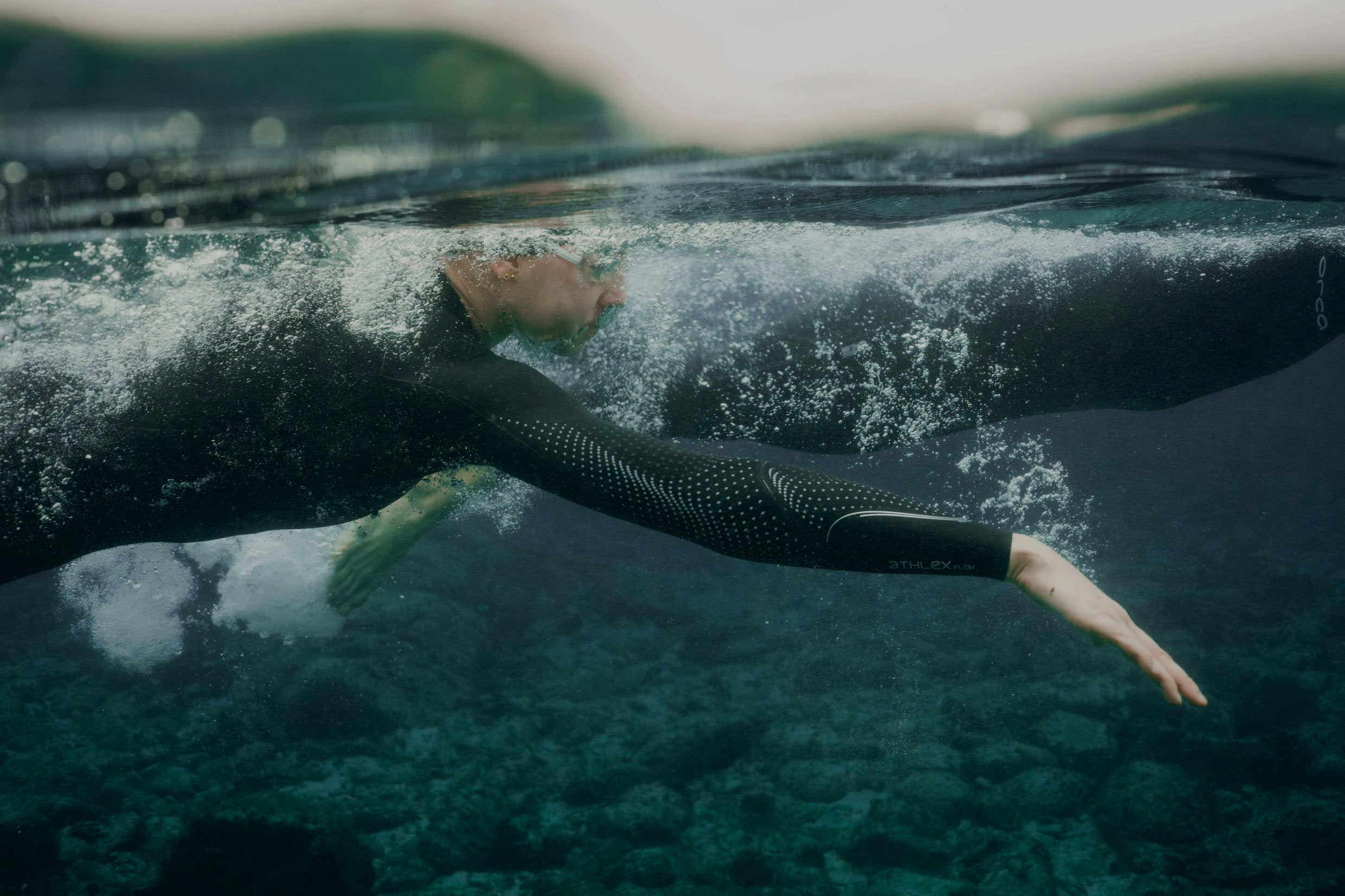 Open-water swimmer wearing an ORCA wetsuit